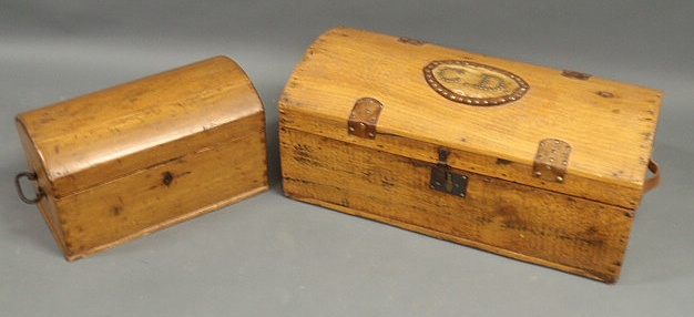 Appraisal: Two small pine trunks with dome lids h x w