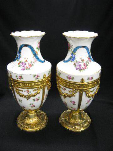 Appraisal: Pair of Sevres Style Porcelain Sterling Vases elaborate silver with