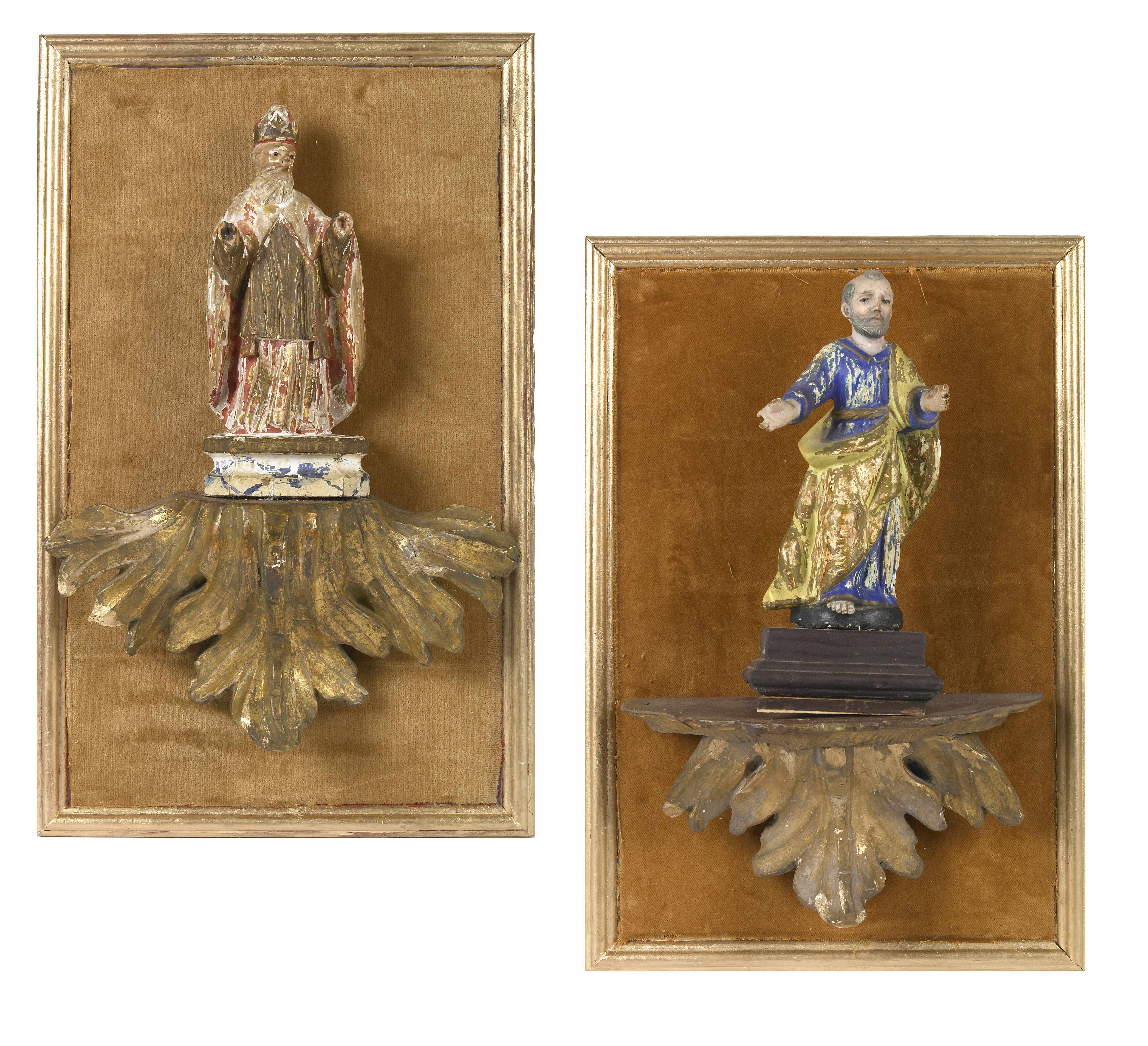 Appraisal: A group of two polychrome decorated figures of saints on