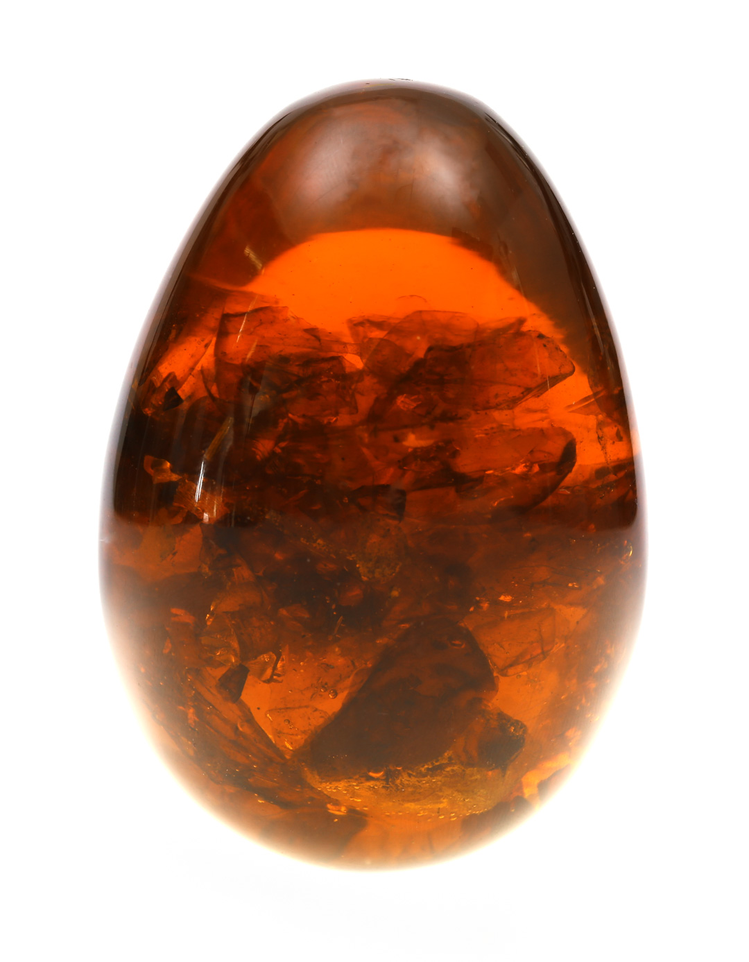 Appraisal: A Solid Russian Amber Egg Fossilized tree resin with beautifully