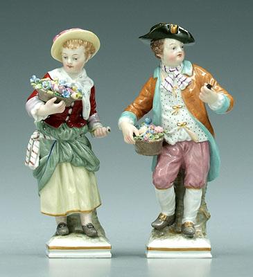 Appraisal: Two KPM figures boy and girl each holding basket of