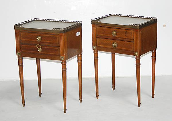 Appraisal: A pair of Louis XVI style mahogany and marble chiffoniers