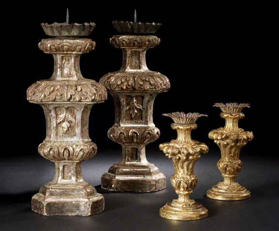 Appraisal: Large Pair of Italian Carved and Silvered Vasiform Pricket Candlesticks