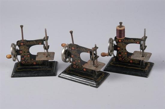 Appraisal: THREE GERMAN TOY SEWING MACHINES Casige