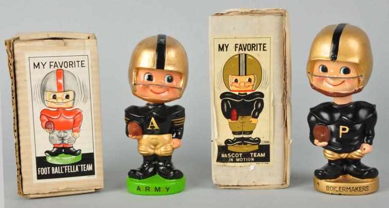 Appraisal: Lot of College Football Bobbing Head Dolls Description Both are