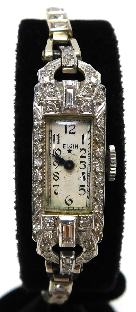 Appraisal: JEWELRY Platinum and K woman's Elgin wristwatch rectangular touchstone tested