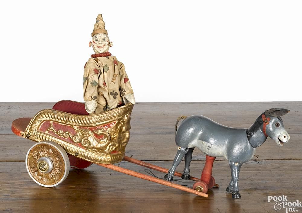 Appraisal: Rare Schoenhut clown and burro chariot pull toy the clown