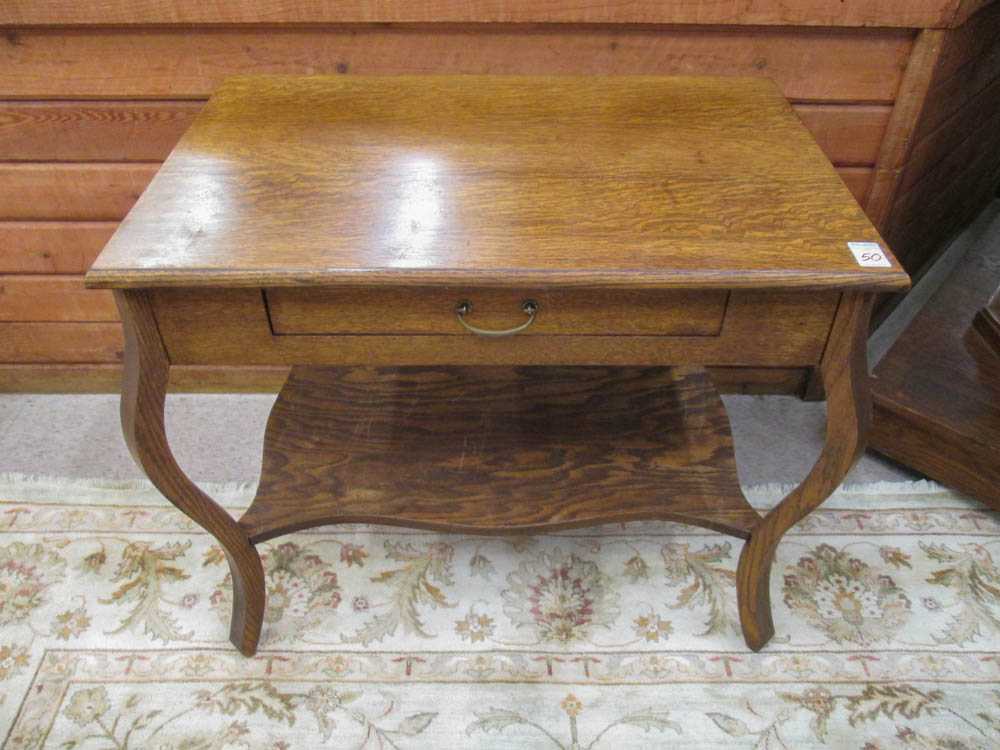 Appraisal: AN OAK LIBRARY TABLE American c having a rectangular top