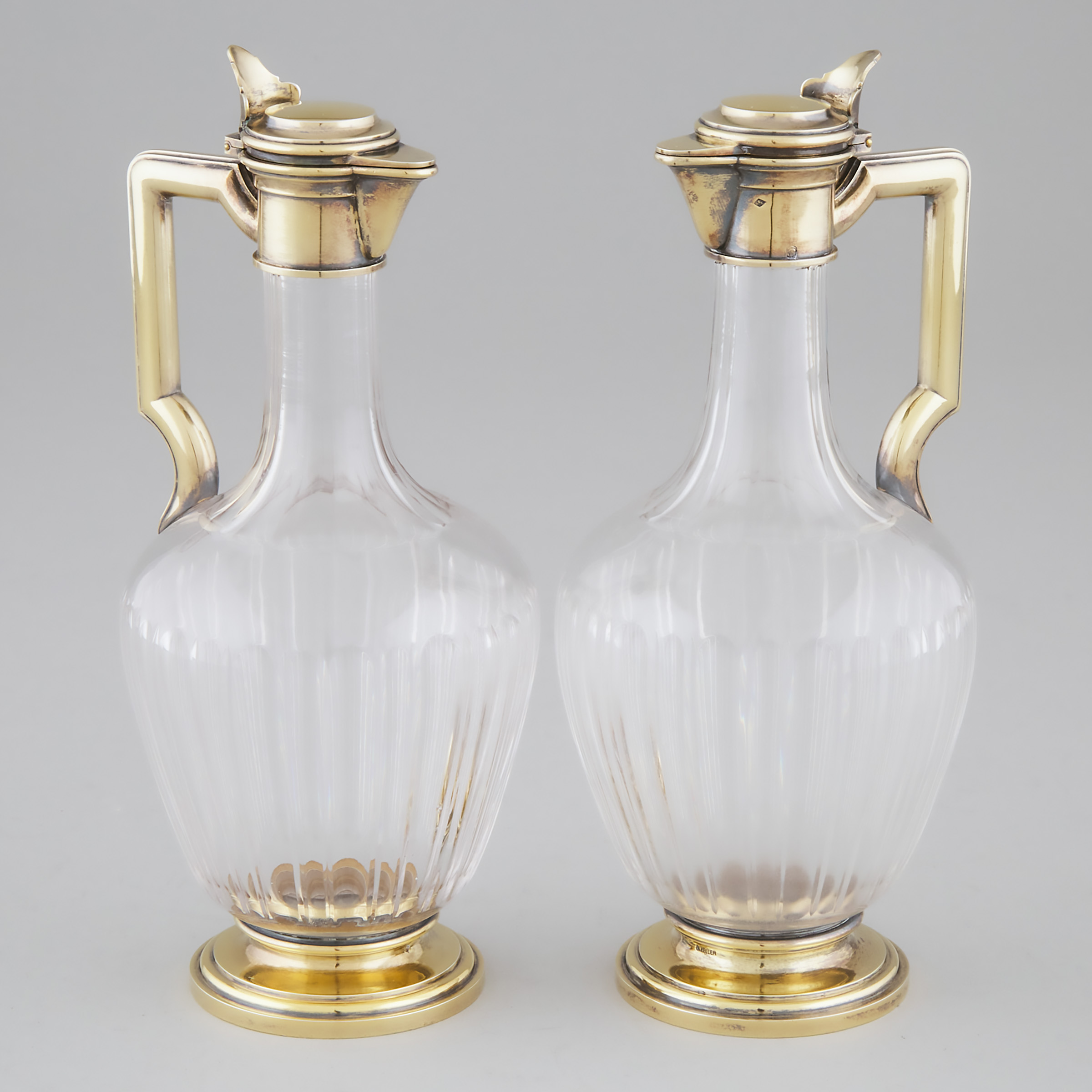 Appraisal: Pair of French Silver-Gilt and Cut Glass Wine Ewers Gustave