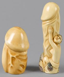 Appraisal: Two Japanese Meiji period carved ivory erotic phallus netsukes