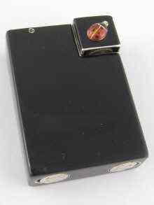 Appraisal: A French hallmarked silver and black lacquer cigarette lighter by