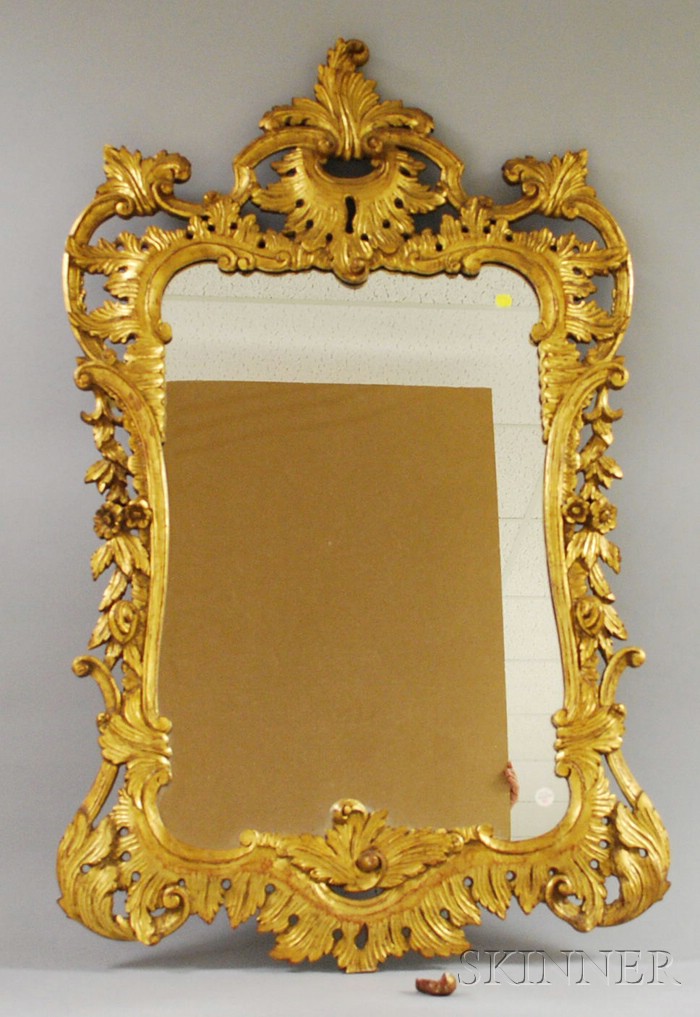 Appraisal: Rococo-style Carved Giltwood Mirror small repairs and piece detached lg