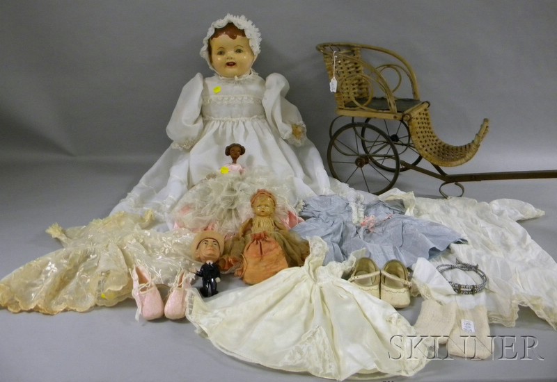 Appraisal: Group of Dolls and Dolls Clothing a large baby doll