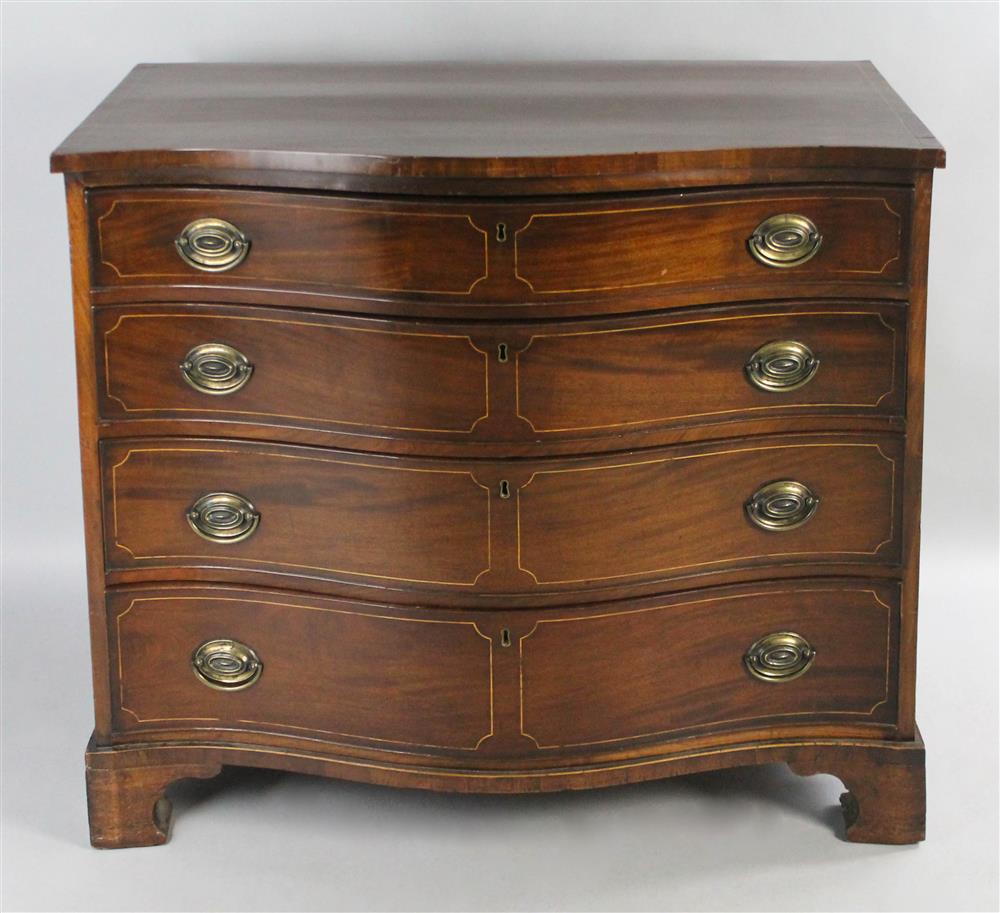 Appraisal: ENGLISH TRANSITIONALSTYLE MAHOGANY SERPENTINE-FRONT CHEST OF DRAWERS purchased in England