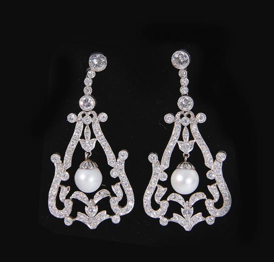 Appraisal: Art deco platinum diamond and pearl chandelier earrings one hundred