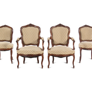 Appraisal: A Set of Four Louis XV Style Carved Walnut Chairs