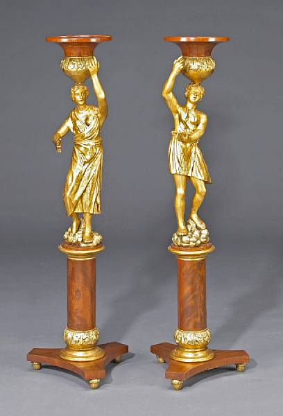 Appraisal: A pair of Italian Baroque style carved giltwood and walnut