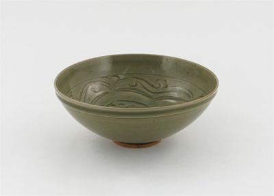 Appraisal: A Chinese celadon bowl finely carved with a central roundel