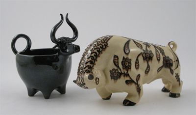 Appraisal: A Hastings Pottery model of a bull glazed brown and