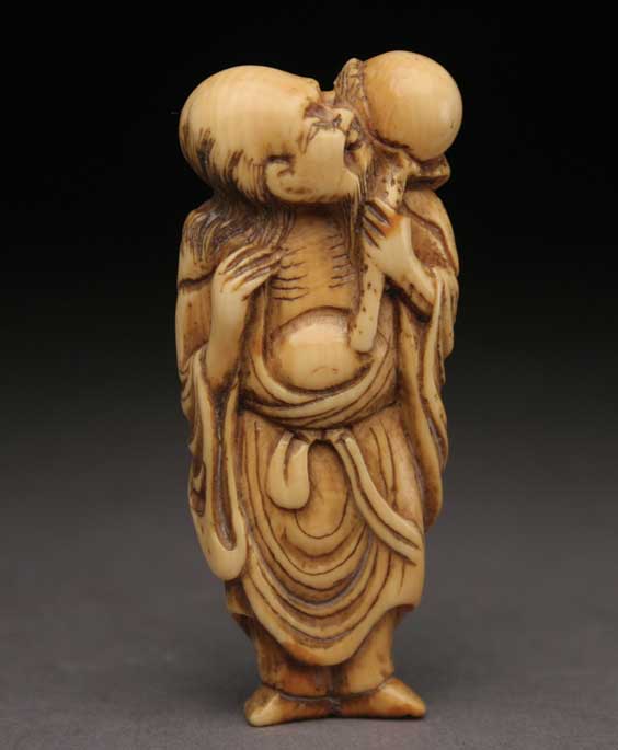 Appraisal: ANTIQUE IVORY NETSUKE Well carved and antique carved ivory netsuke