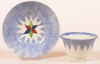 Appraisal: Blue Spatter Six Pointed Star Cup and Saucer Blue Spatter