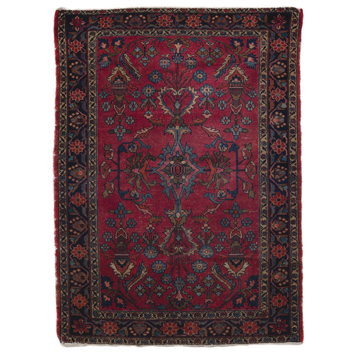 Appraisal: Sarouk rug c stylized floral design on a red field