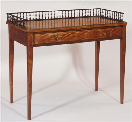 Appraisal: An early th century mahogany and satinwood side table the