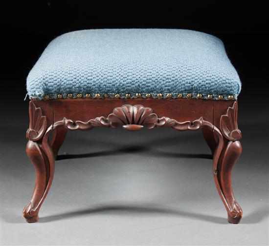 Appraisal: Rococo Revival walnut upholstered ottoman late th century carved shell