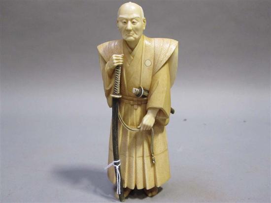 Appraisal: ASIAN BROWN PATINA CARVED IVORY FIGURE OF A ROBED ELDER