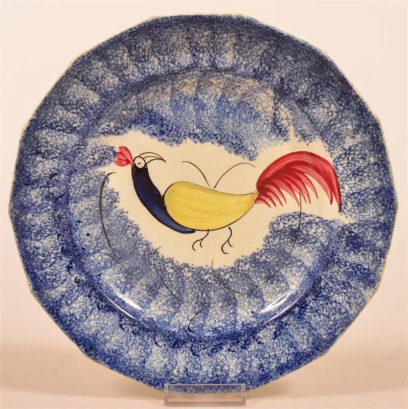 Appraisal: Blue Spatter Rooster Peafowl Paneled Plate Blue Spatter Ironstone China