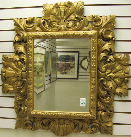 Appraisal: BAROQUE STYLE WALL MIRROR in wide carved and molded acanthus