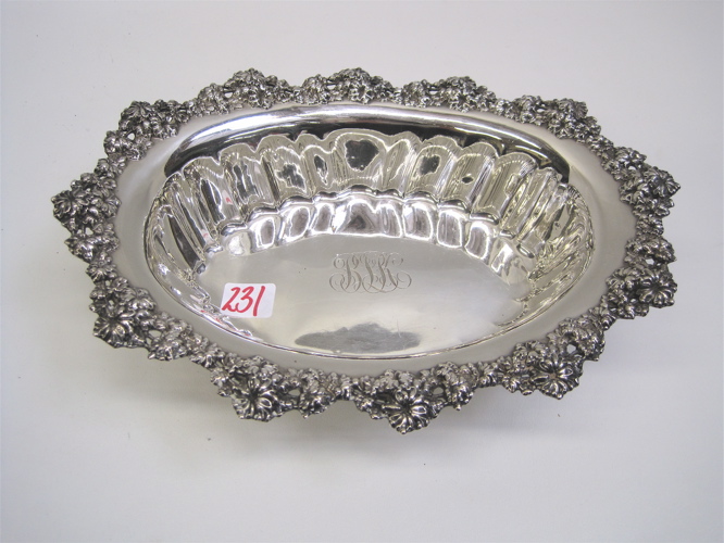 Appraisal: AMERICAN STERLING SILVER BOWL heavy relief floral decoration around rim