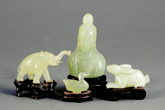 Appraisal: Four carved jade figurines Quan Yin bust H elephant H