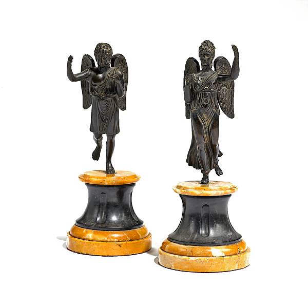 Appraisal: A pair of Empire patinated bronze sienna and black marble