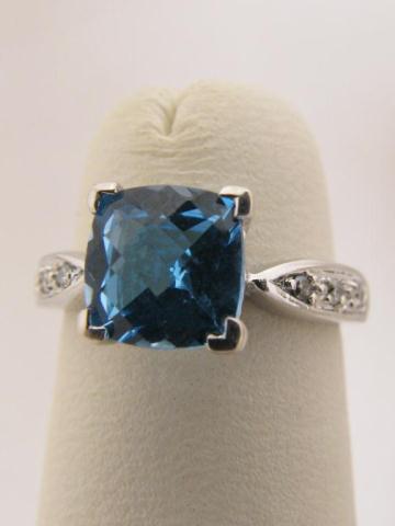 Appraisal: Lady's K white gold ring blue topaz accent diamonds