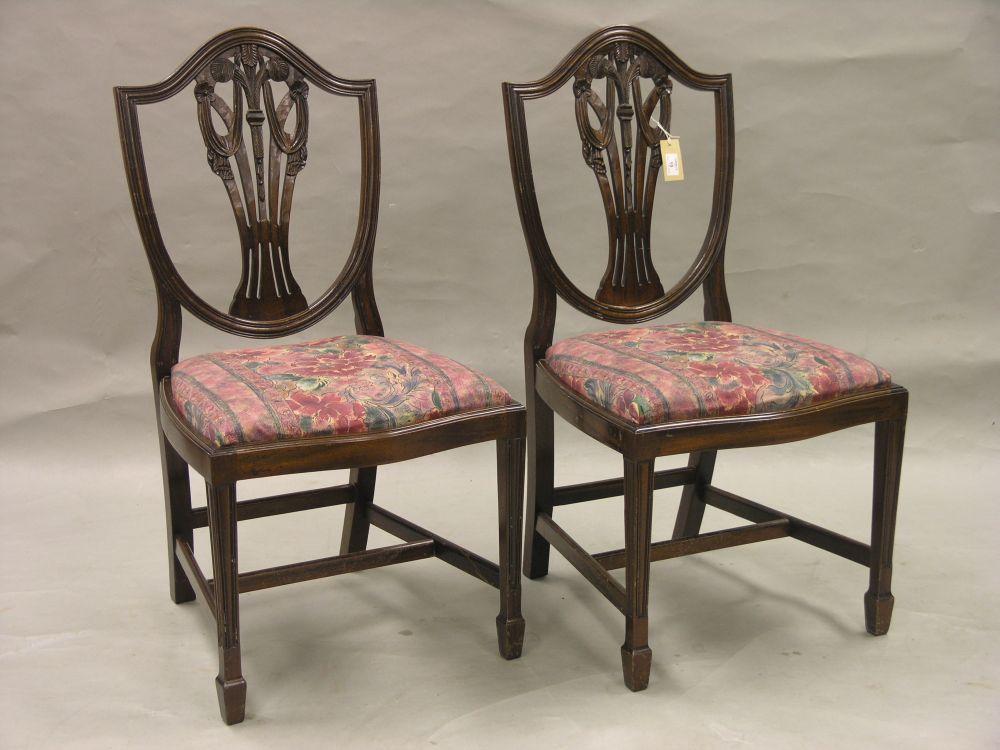 Appraisal: A set of six Hepplewhite style mahogany dining chairs including