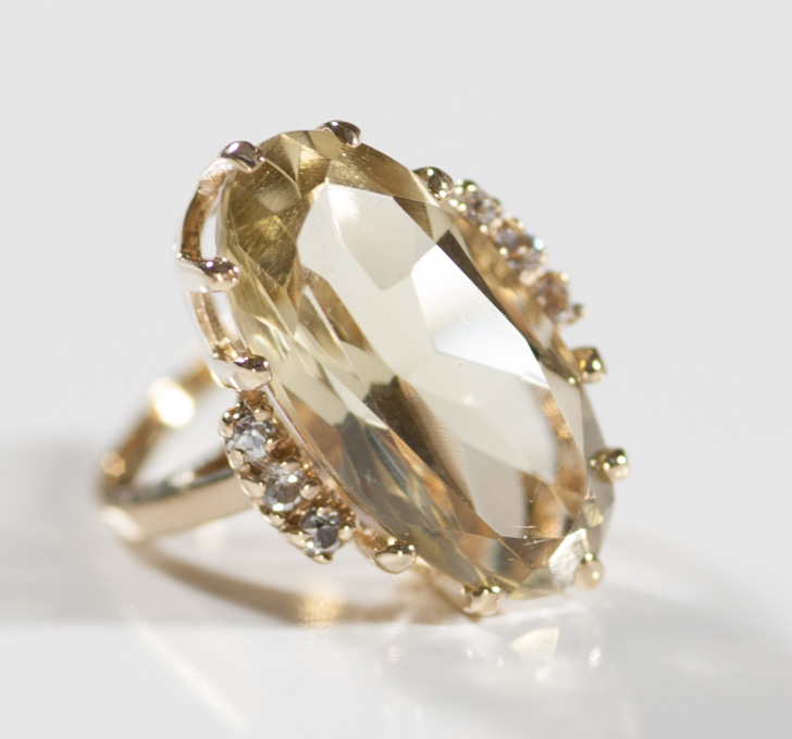 Appraisal: CITRINE DIAMOND AND TEN KARAT GOLD RING with three round-cut