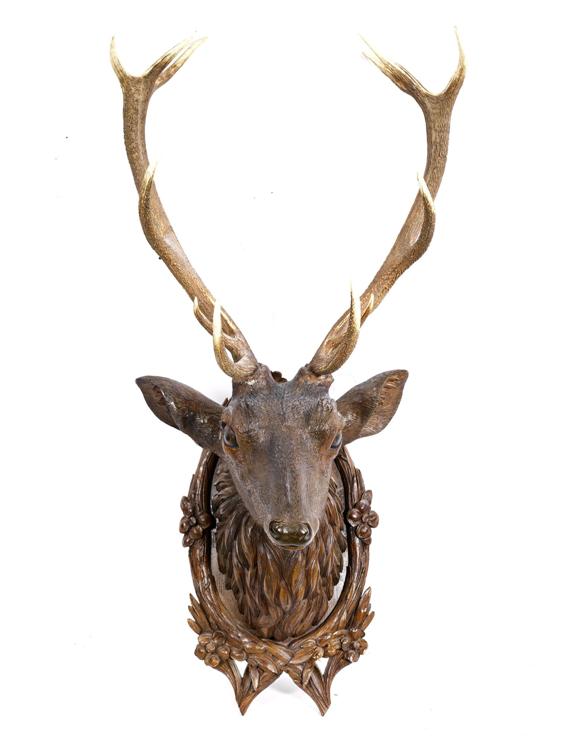 Appraisal: DEER HEAD probably Brienz th century Walnut carved full round