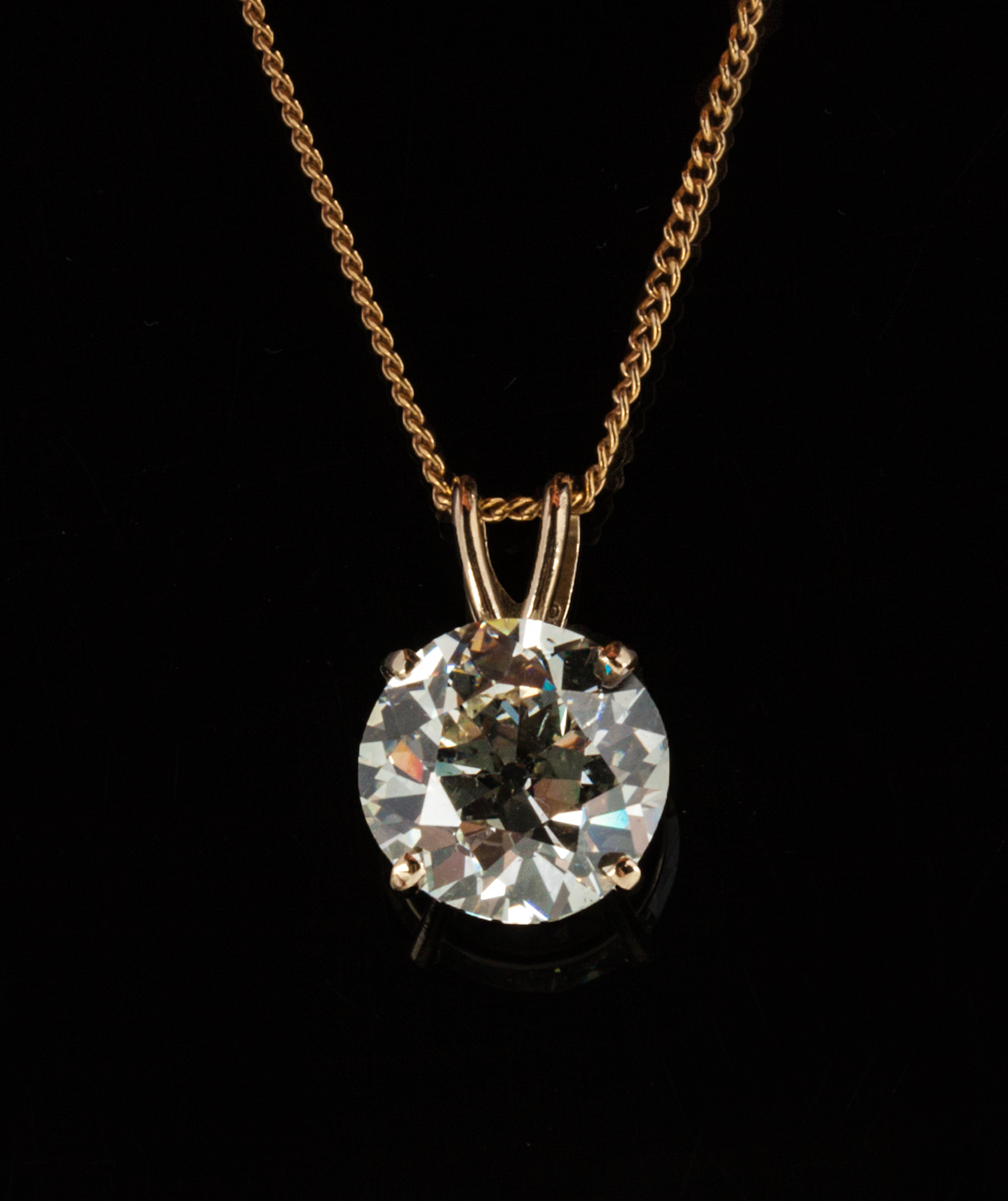 Appraisal: Diamond Necklace K gold four prong pendant setting with an