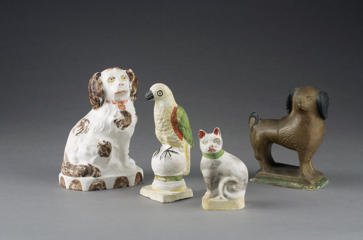 Appraisal: CHALKWARE FIGURE OF A SPANIEL Height inches