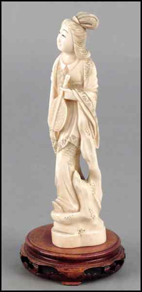 Appraisal: CARVED IVORY FIGURE OF A MAIDEN WITH AN INSTRUMENT Together