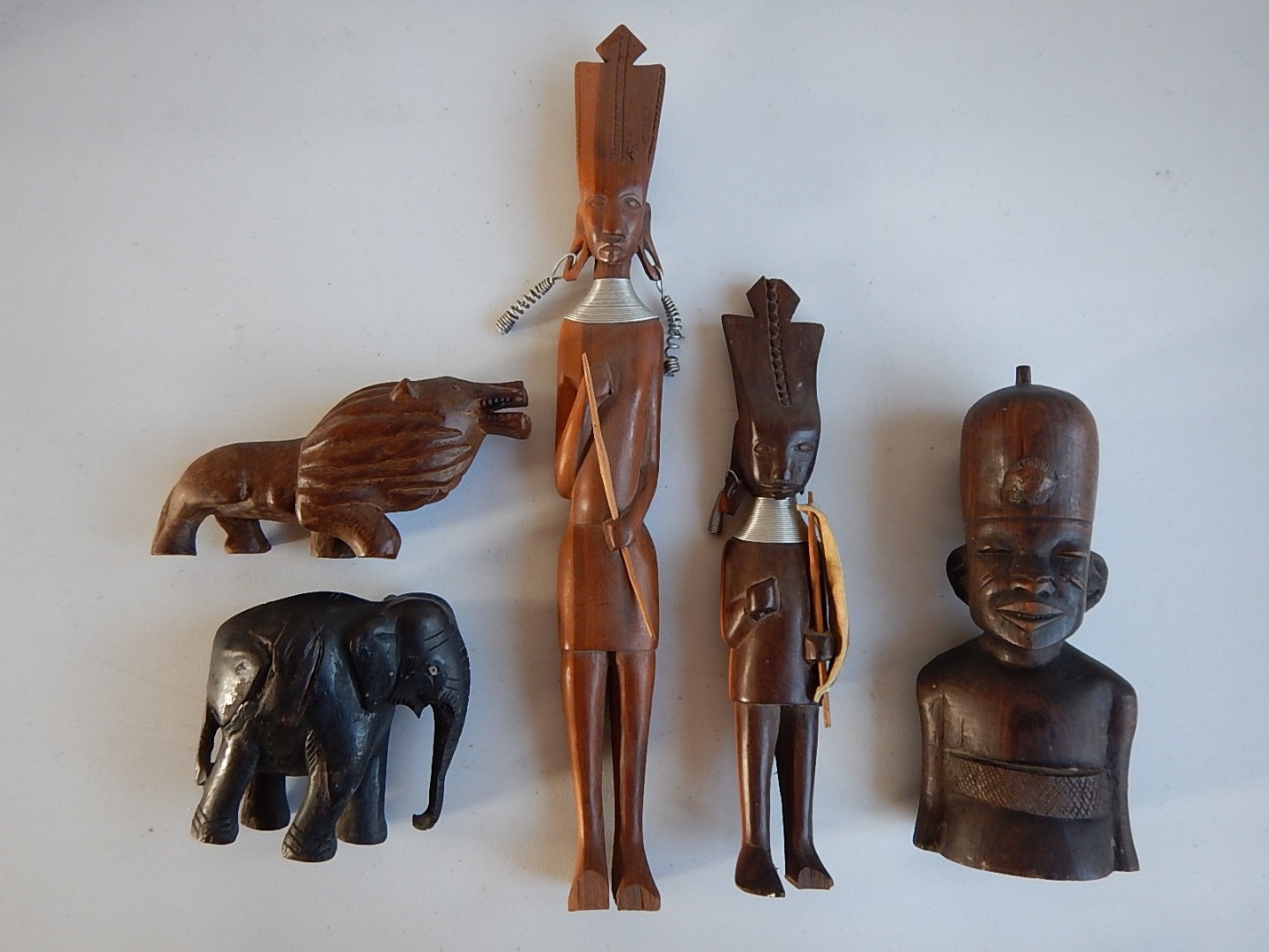 Appraisal: A group of African tribal carvings including a male bust