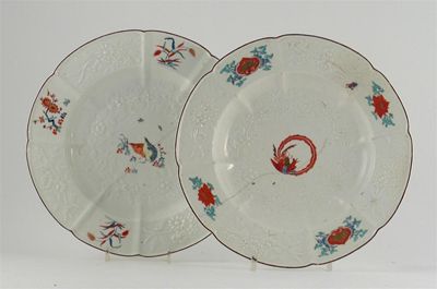 Appraisal: A Chelsea plate moulded with flowers and painted in the