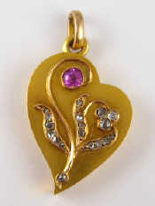 Appraisal: An antique gold locket designed as a stylised heart with