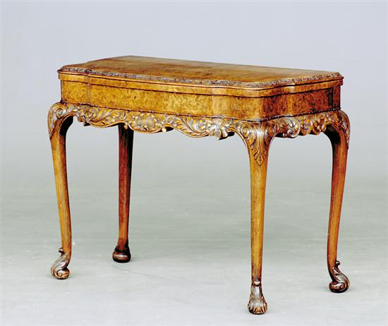 Appraisal: Chippendale style walnut and burl game table shaped top with