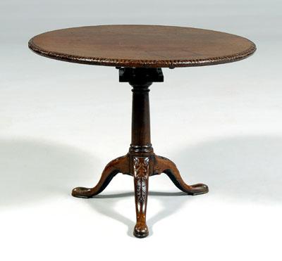 Appraisal: Chippendale carved tea table single-board mahogany top with carved edge