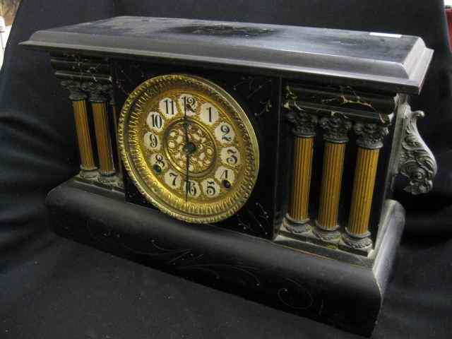 Appraisal: Gilbert Mantle Clock ebonized wooden case with column decor ''