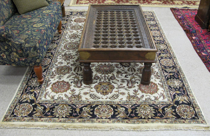 Appraisal: HAND KNOTTED ORIENTAL CARPET Persian Kashan design overall scrolling floral