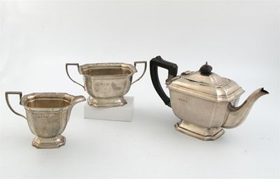 Appraisal: A modern panelled three piece teaset by Elkington Co Birmingham