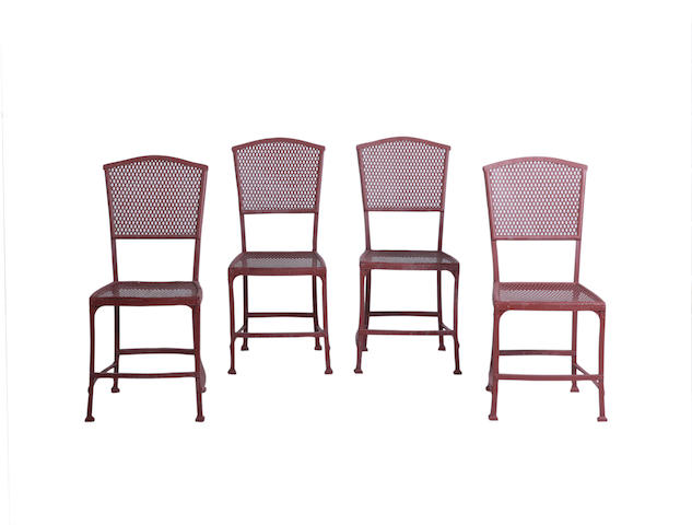 Appraisal: A set of four French riveted-iron garden seats The perforated